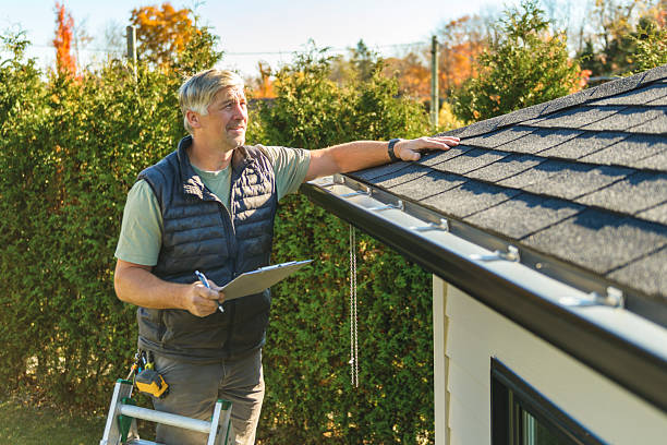 Professional Roofing technician working in West Mystic, CT